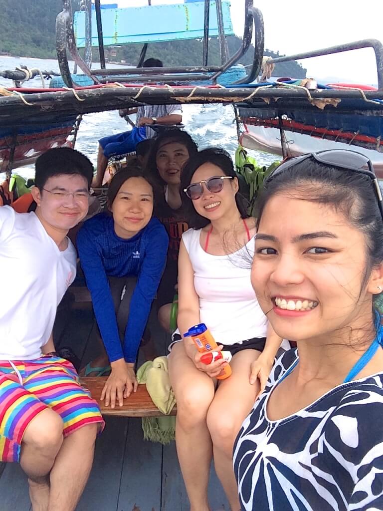 On the long-tail boat taking us to snorkelling trip.