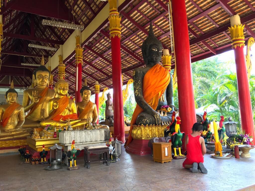 The boat tour let us stop at a local temple to worship the Buddha images.